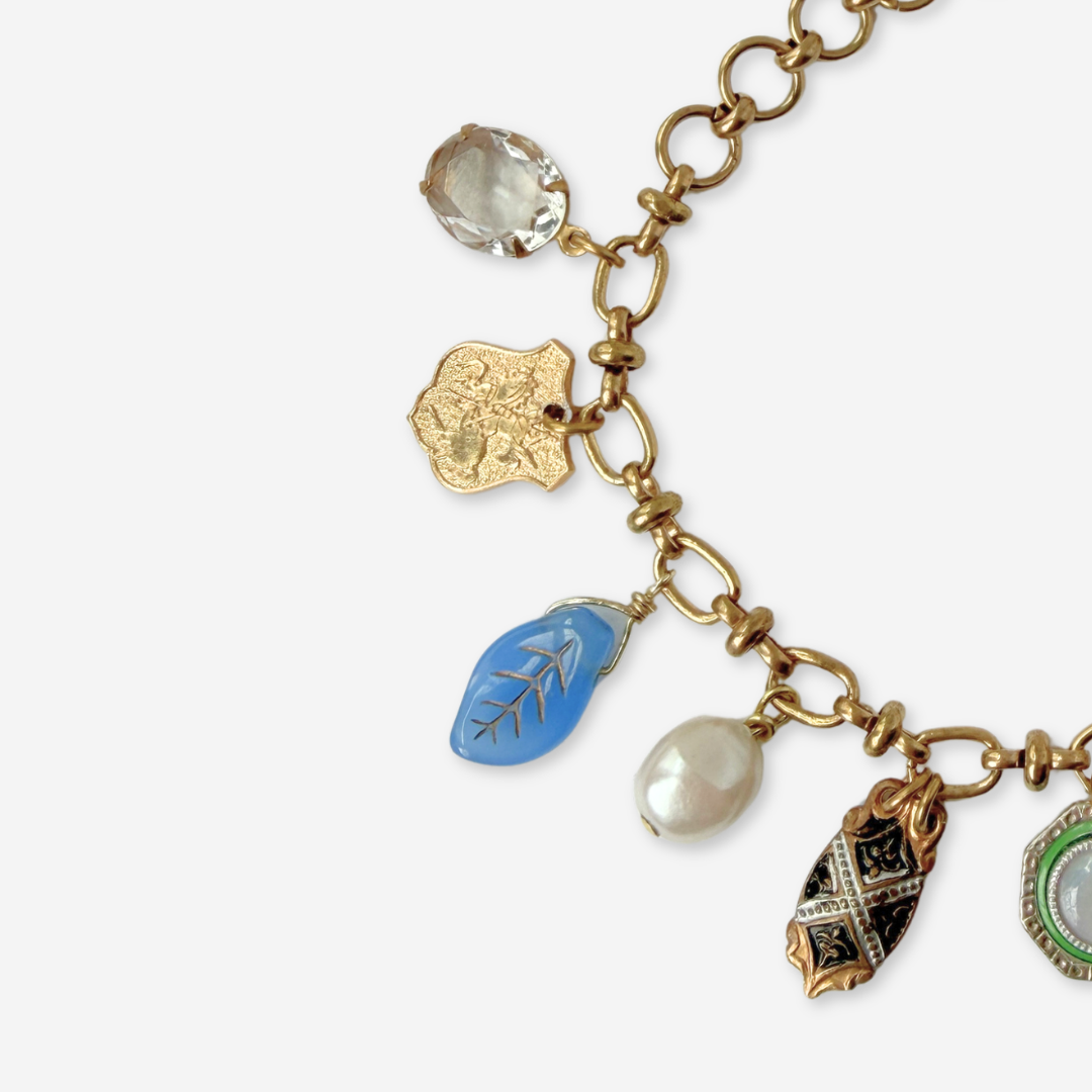 Repurposed vintage green and blue mixed charm bracelet