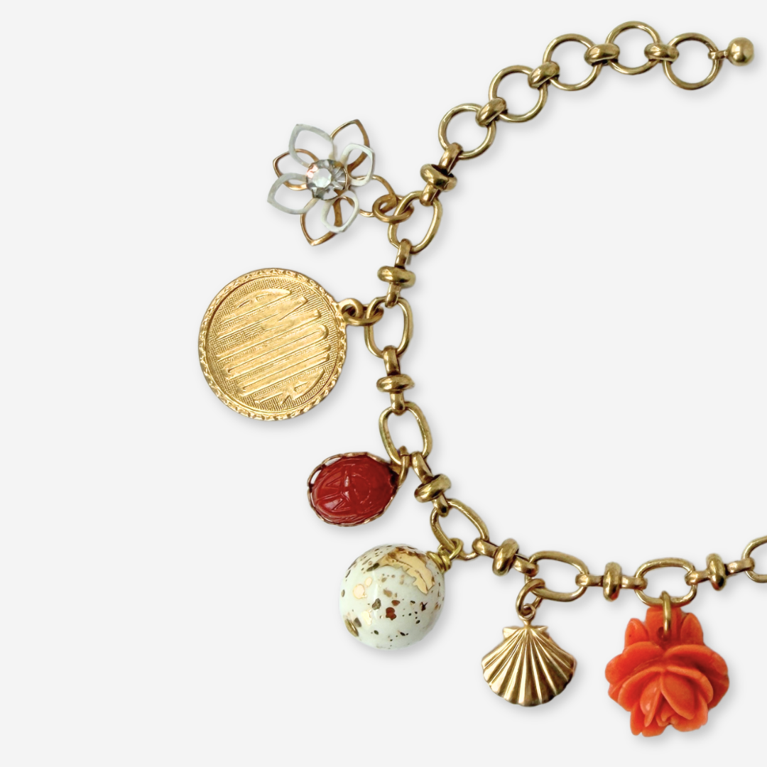 Repurposed vintage mixed charm bracelet