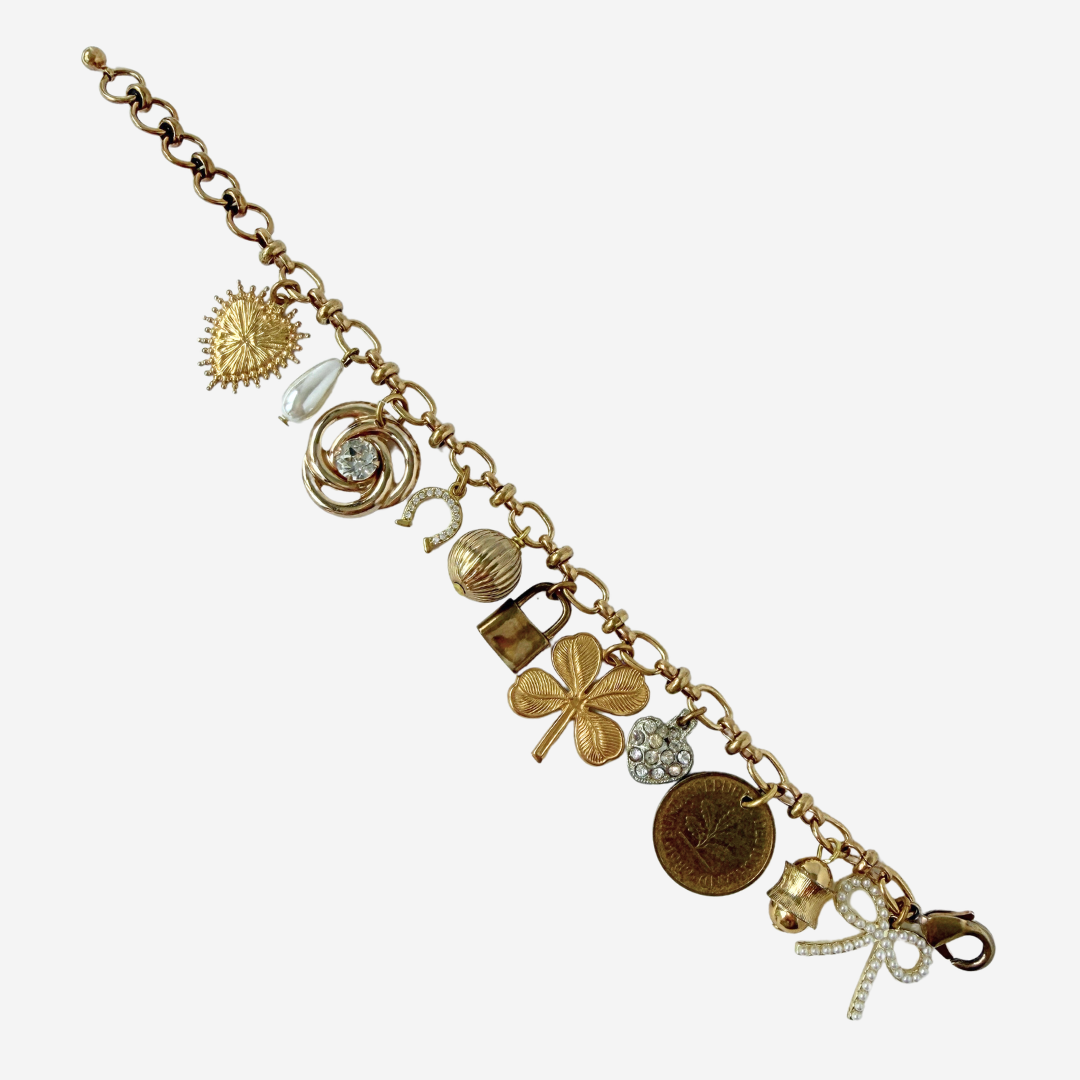 Repurposed vintage mixed neutral charm bracelet