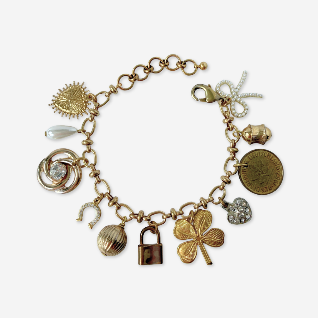 Repurposed vintage mixed neutral charm bracelet