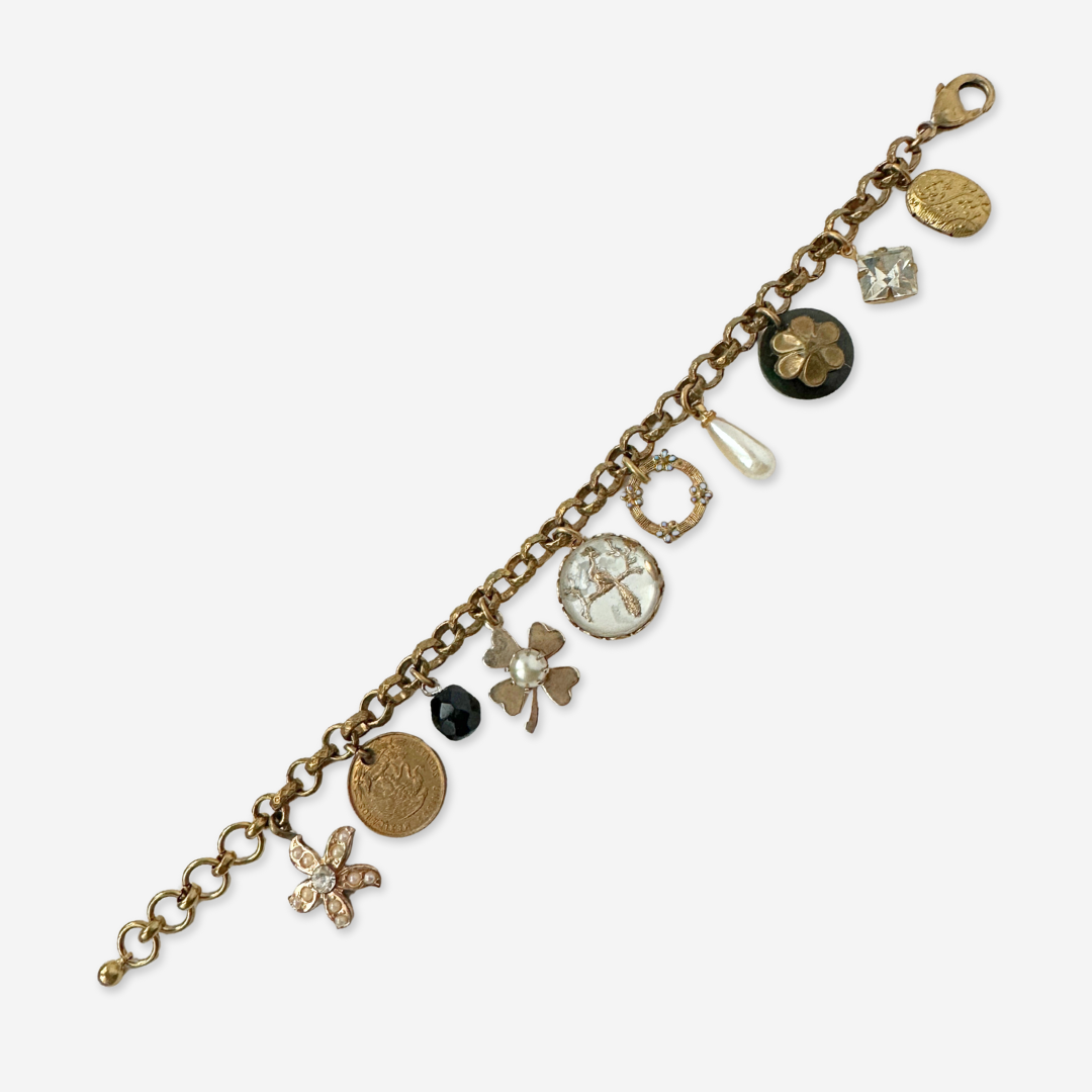 Repurposed vintage pearl and gold tone peacock charm bracelet