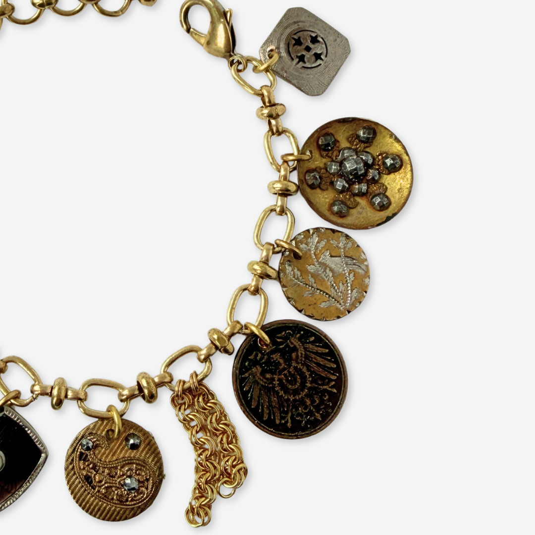 Repurposed vintage mixed neutral charm bracelet