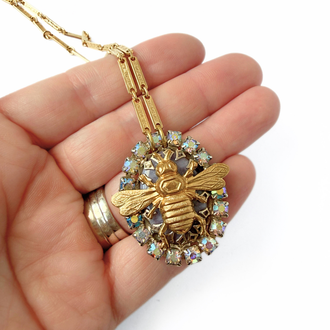 Refashioned vintage lavender and iridescent rhinestone oval bee pendant