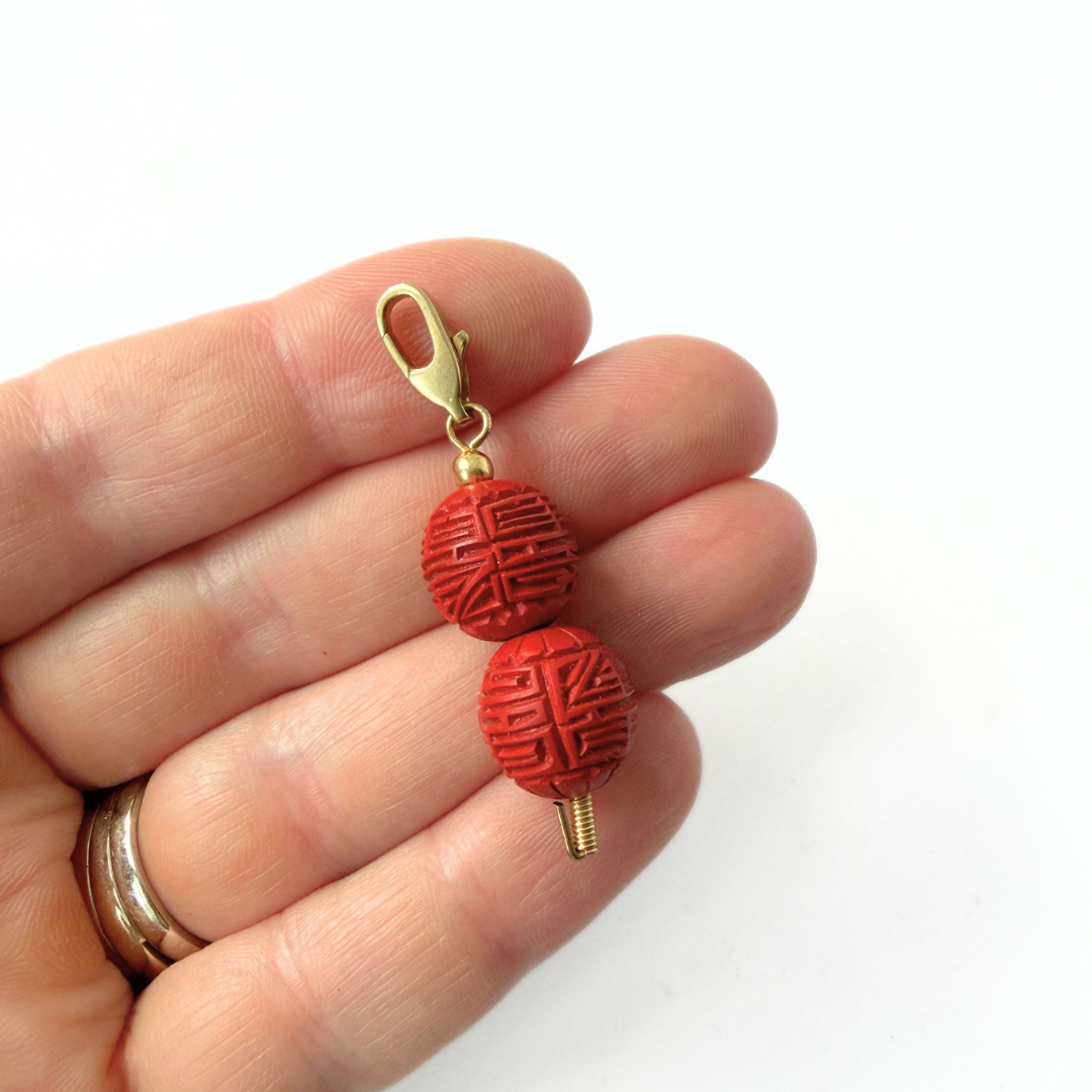 Vintage carved red cinnabar beaded charm