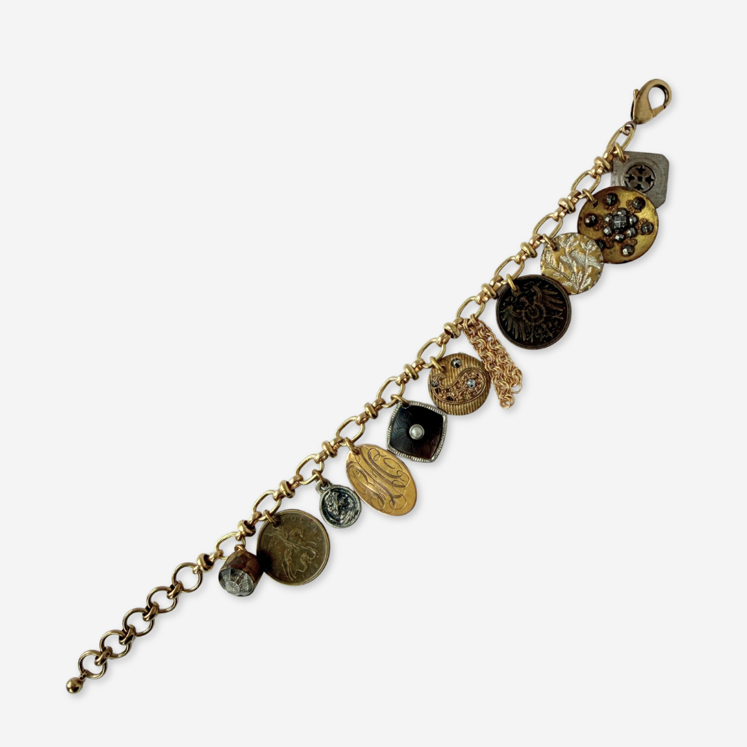 Repurposed vintage mixed neutral charm bracelet