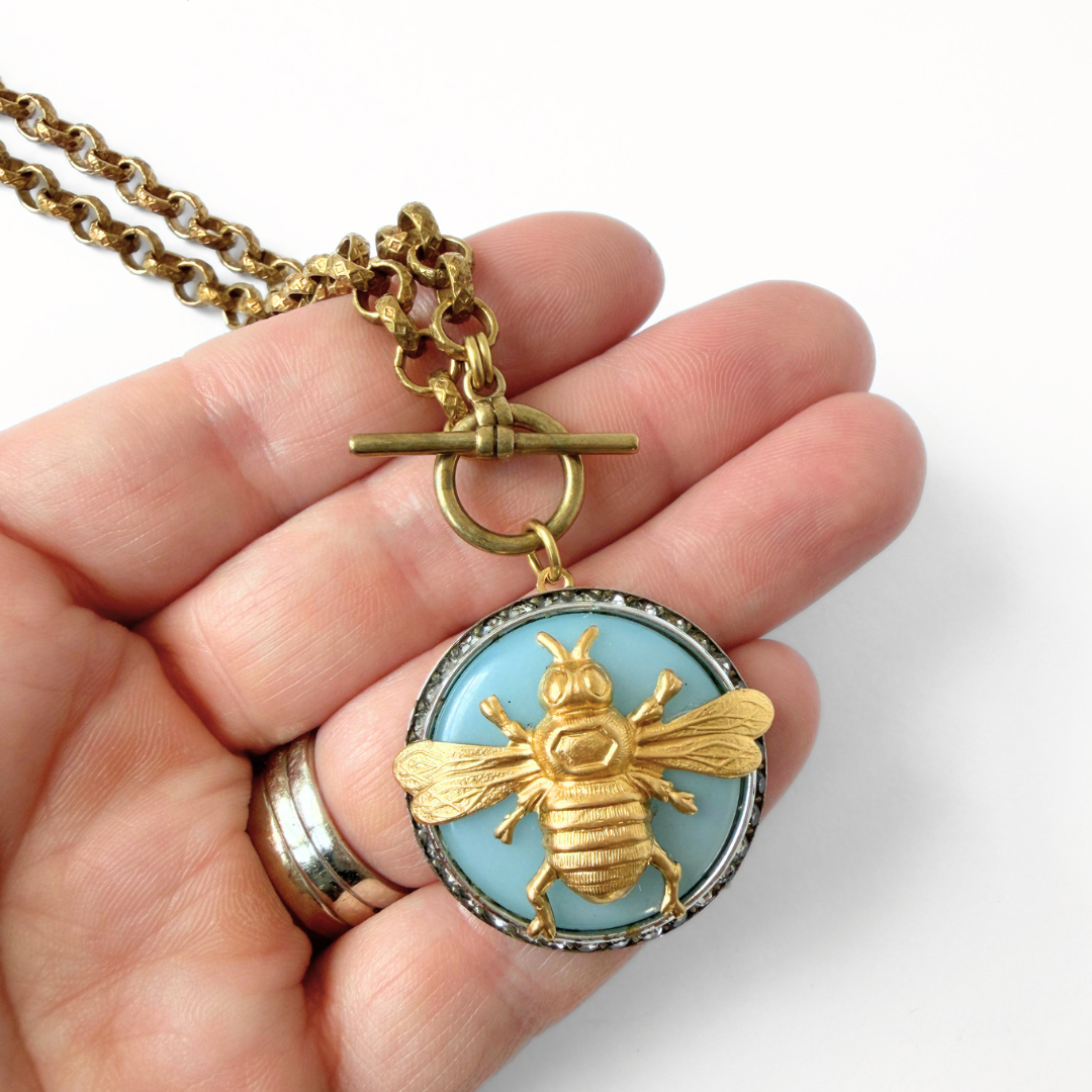 Refashioned vintage light blue and rhinestone brass bee pendant