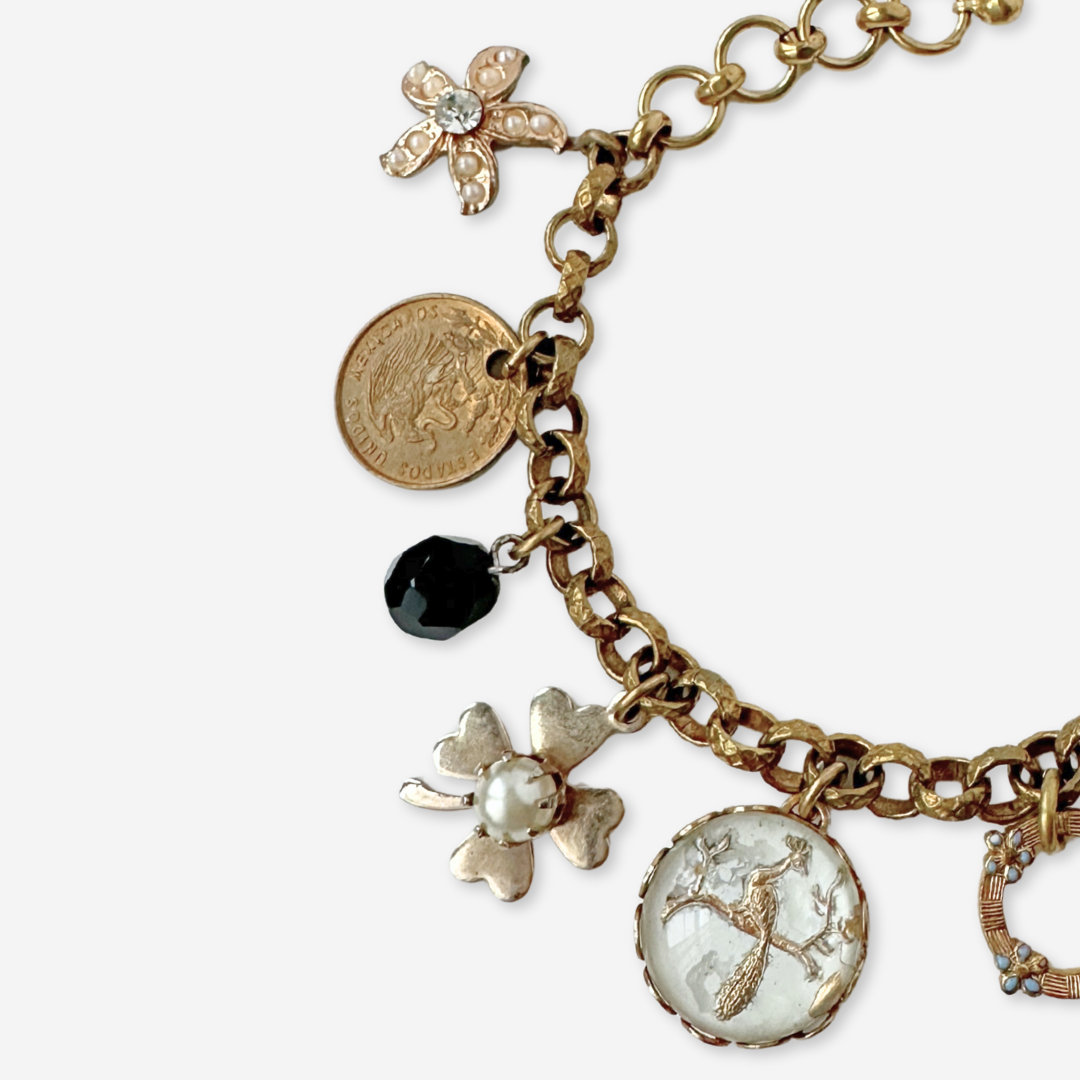 Repurposed vintage pearl and gold tone peacock charm bracelet