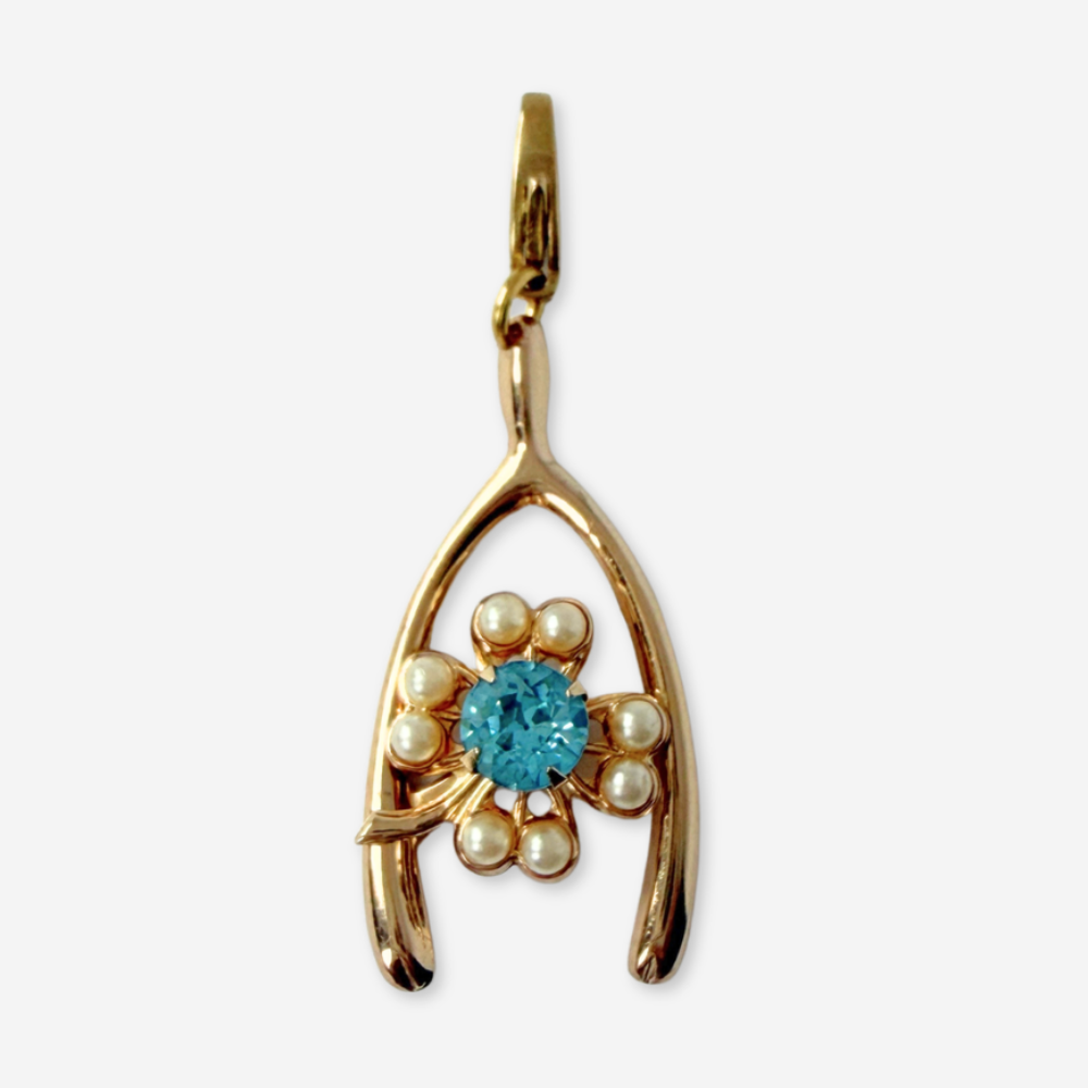 Vintage large gold tone wishbone charm with aqua clover center