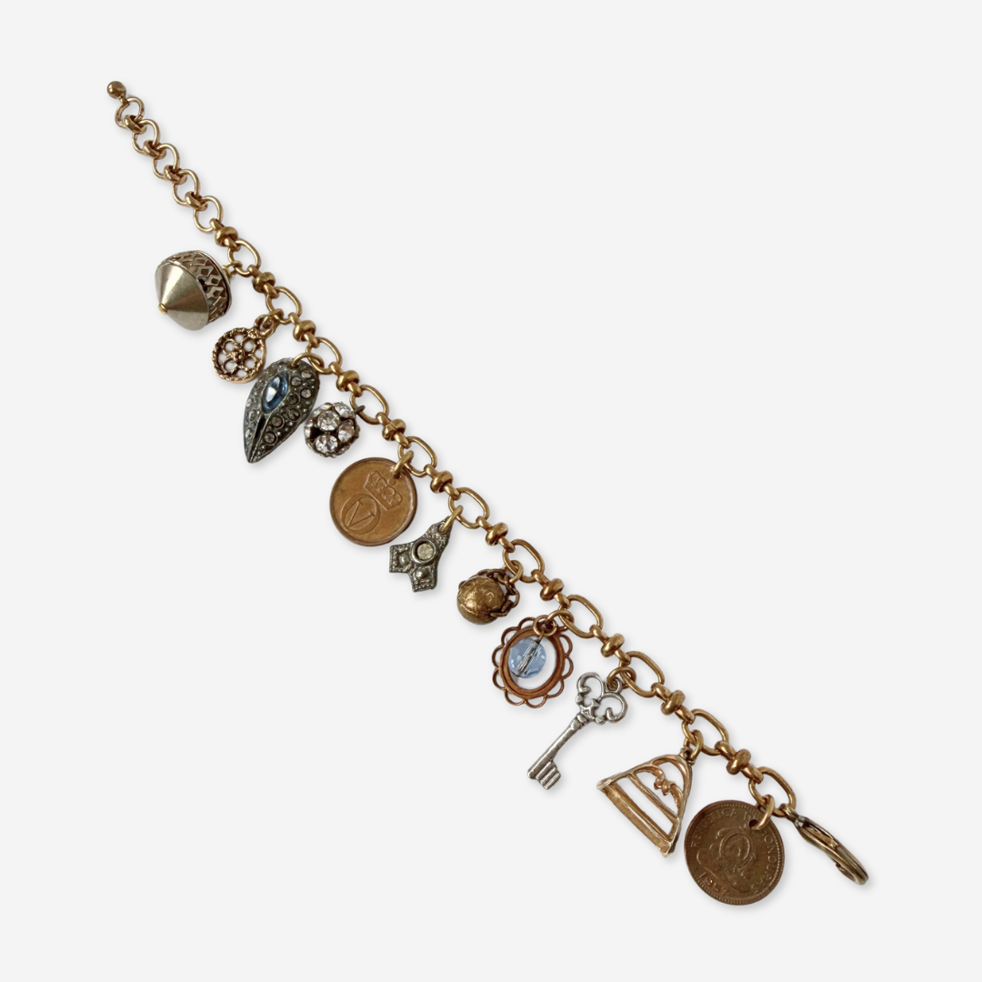 Repurposed vintage mixed charm bracelet