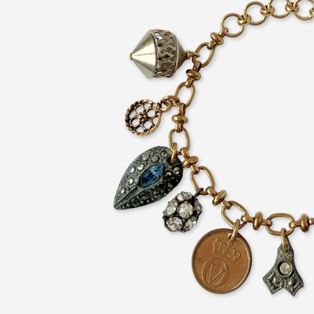 Repurposed vintage mixed charm bracelet