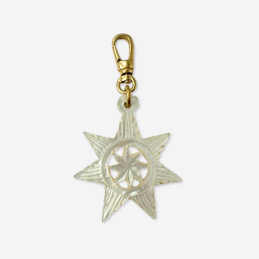 Vintage carved mother of pearl star charm