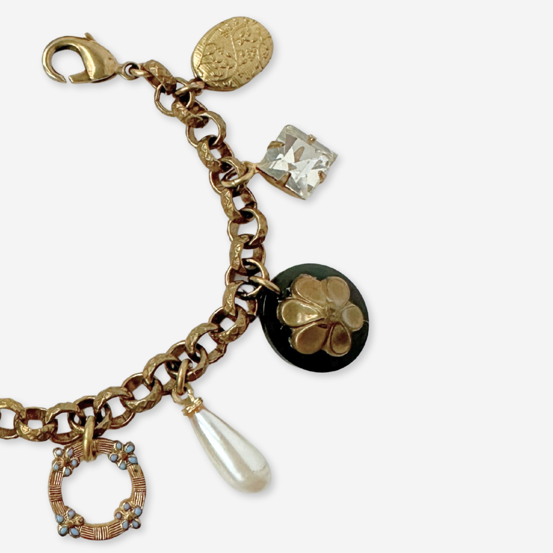 Repurposed vintage pearl and gold tone peacock charm bracelet