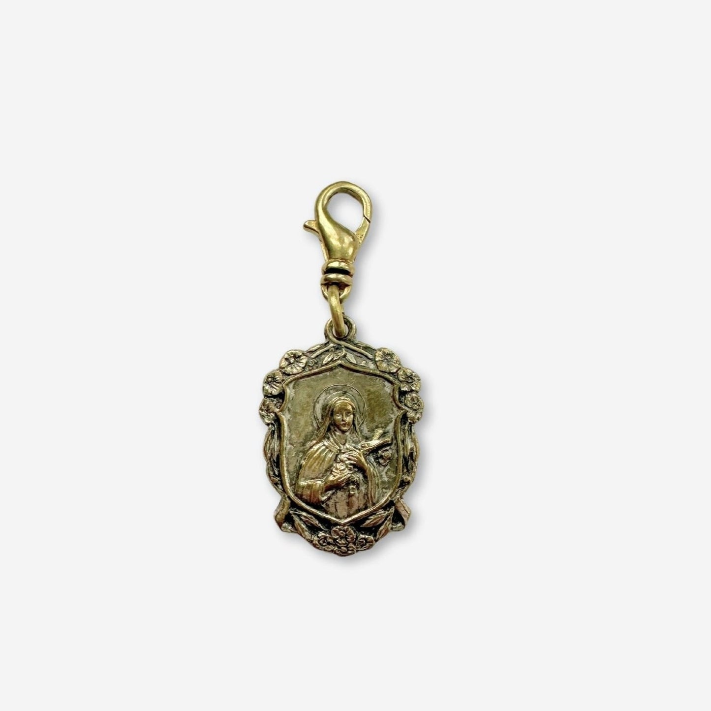 Vintage St. Therese religious medallion charm with brass swivel clasp