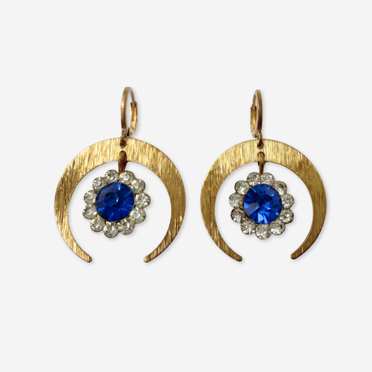 Brass crescent hoop earrings with vintage blue rhinestone drops
