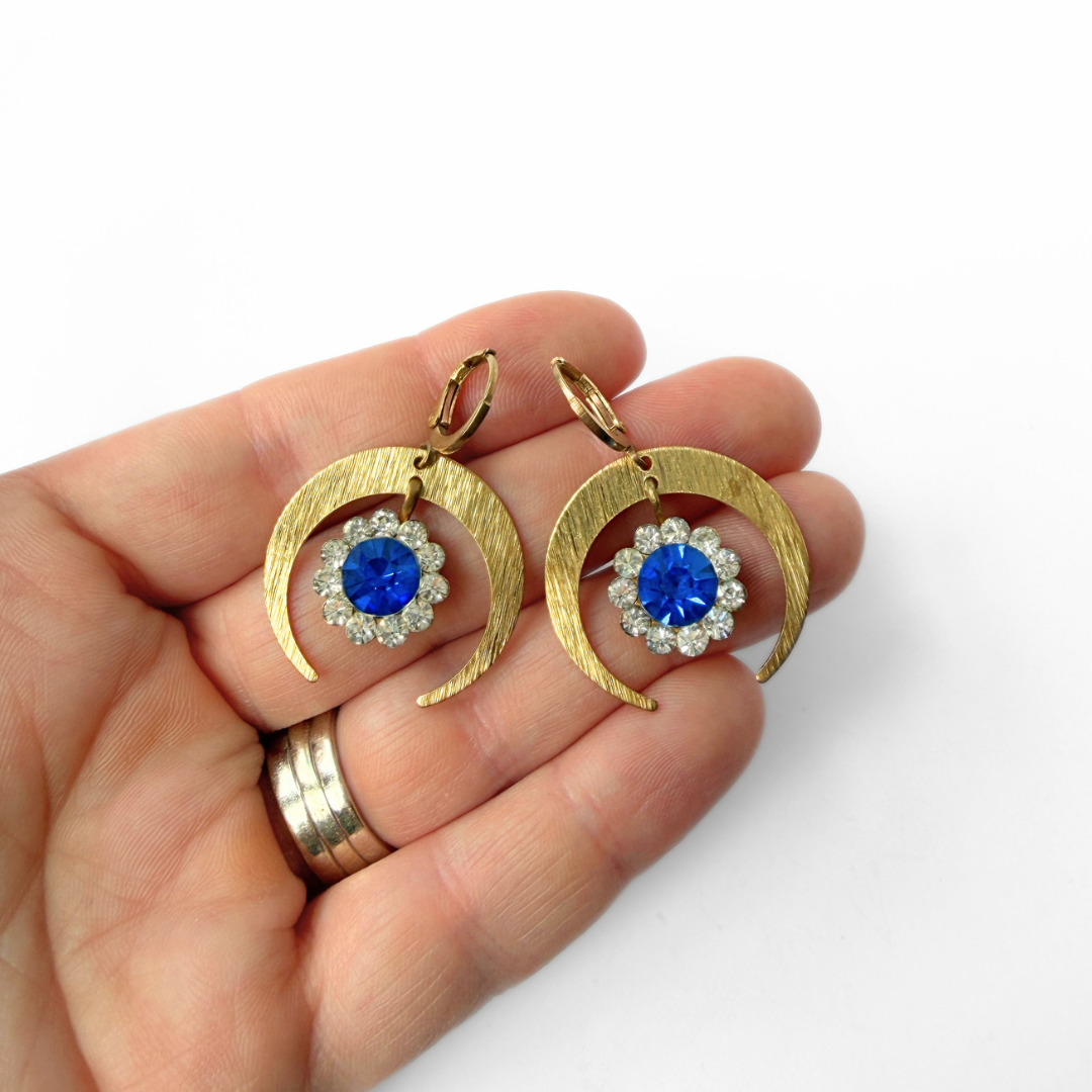 Brass crescent hoop earrings with vintage blue rhinestone drops