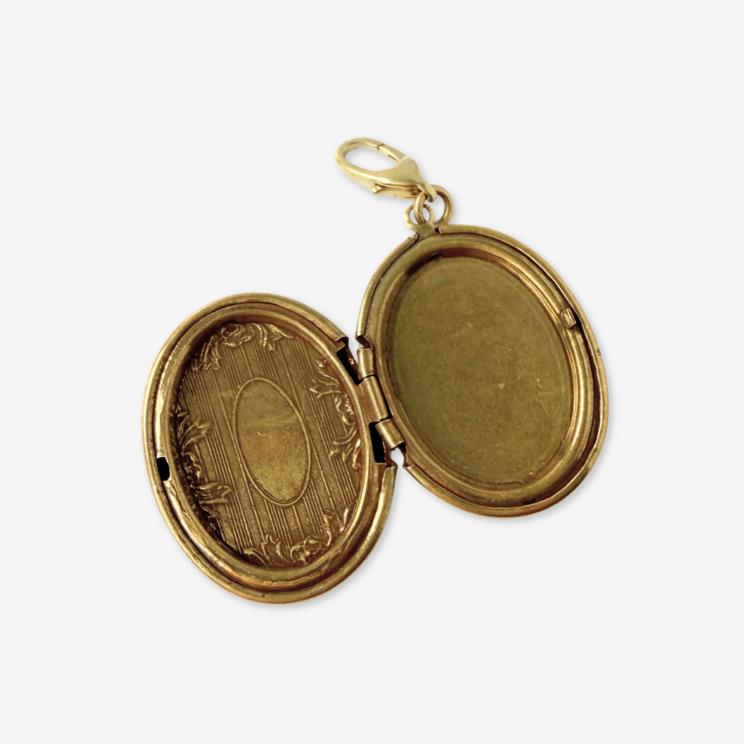 Vintage aged brass oval locket charm