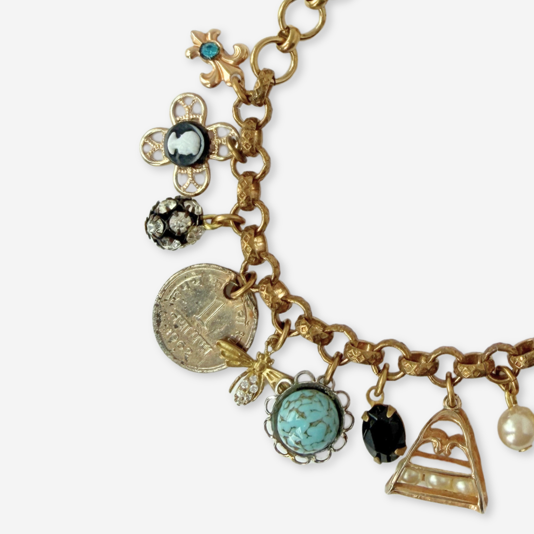 Loaded repurposed vintage mixed charm bracelet