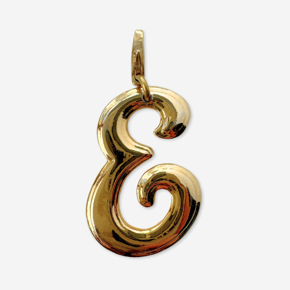 Large vintage shiny gold cursive "E" charm