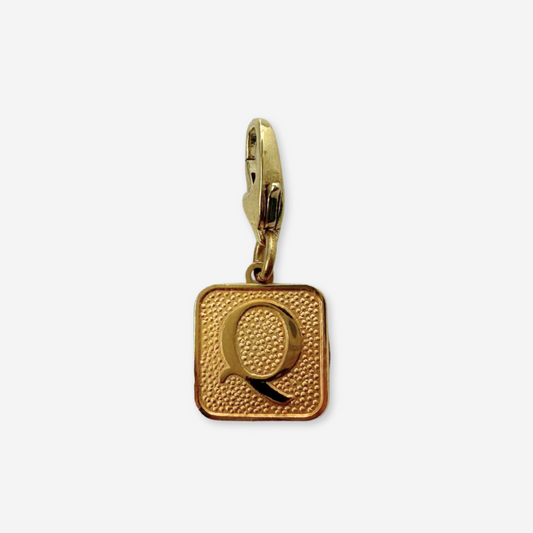 Small vintage gold square "Q"monogram charm