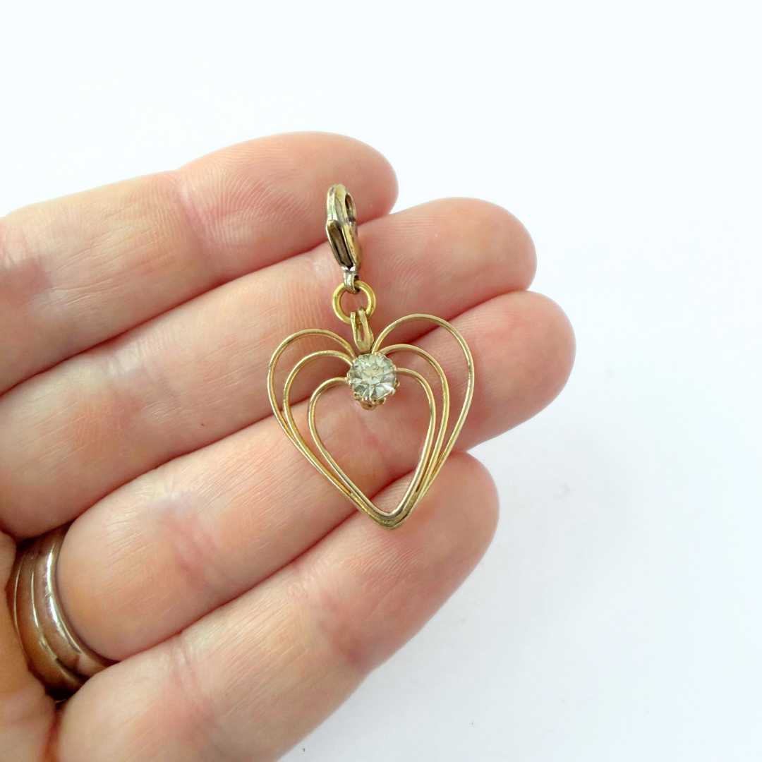 Vintage gold wire heart with clear rhinestone center