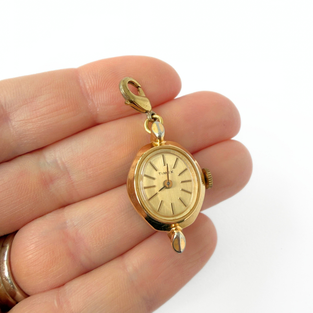 Vintage gold plated "Timex" watch face charm