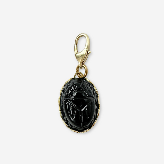 Vintage small black glass scarab charm in brass setting