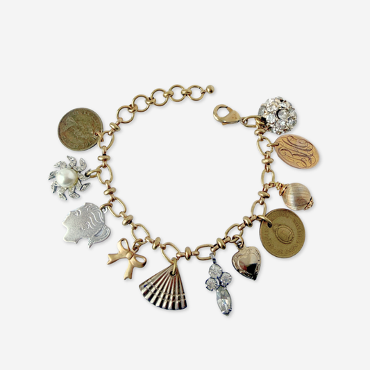 Repurposed vintage mixed neutral charm bracelet