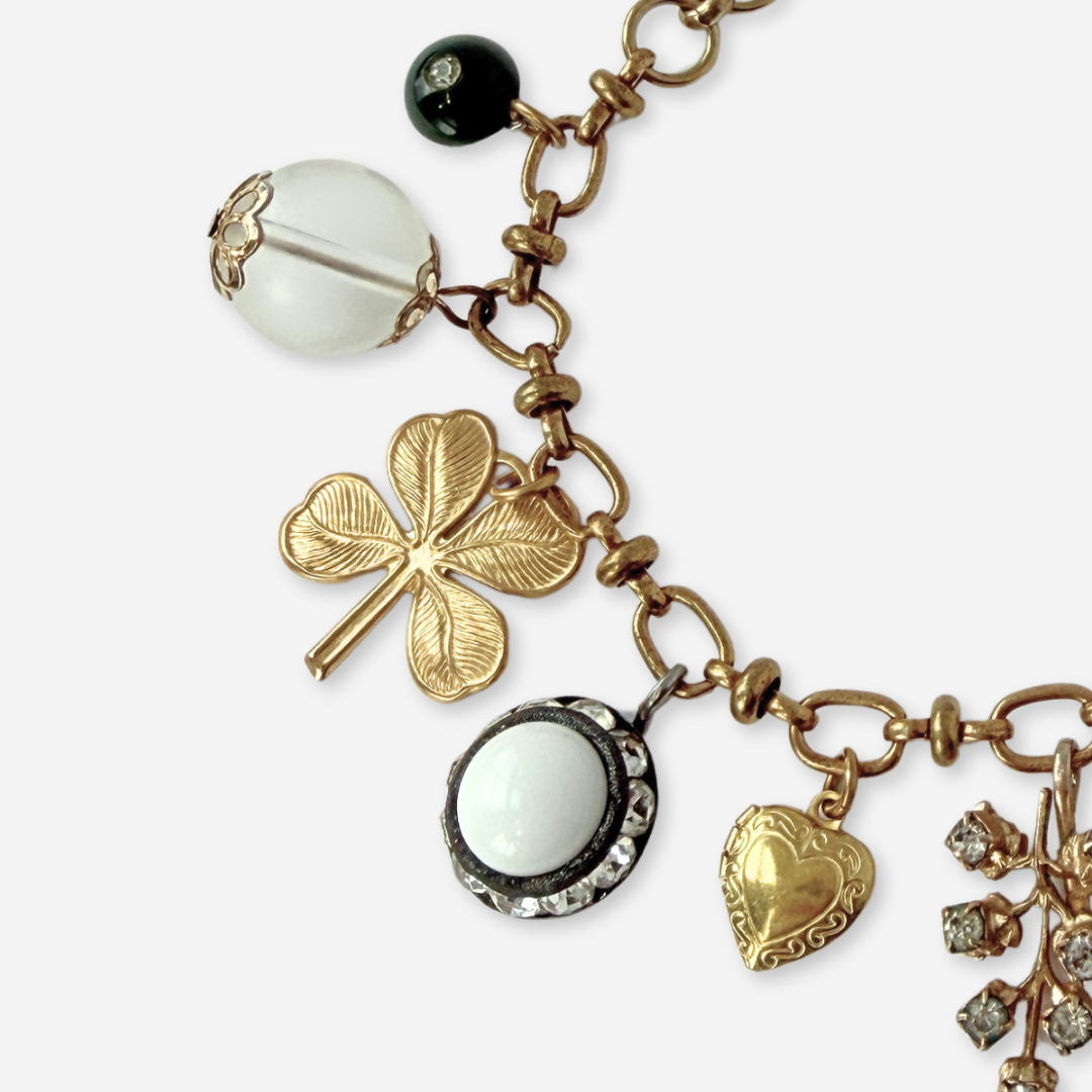 Repurposed vintage mixed charm bracelet