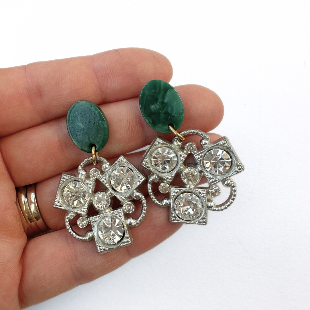 Large clear rhinestone vintage button earrings with green acetate posts