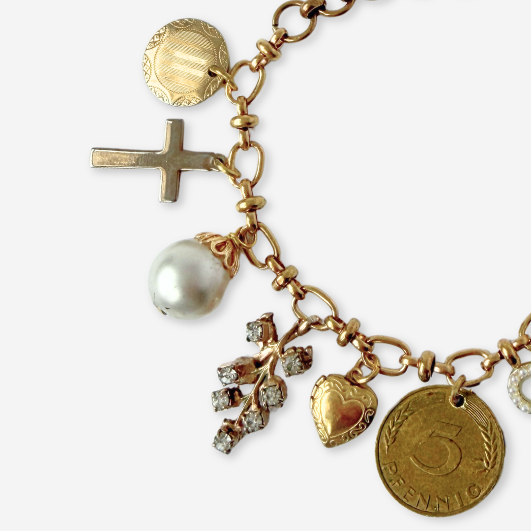 Repurposed vintage mixed neutral charm bracelet