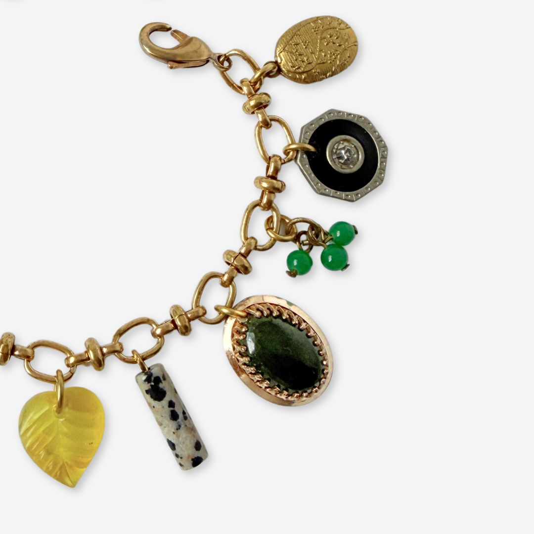 Repurposed vintage mixed charm bracelet
