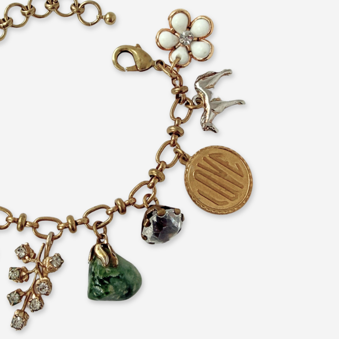Repurposed vintage mixed charm bracelet
