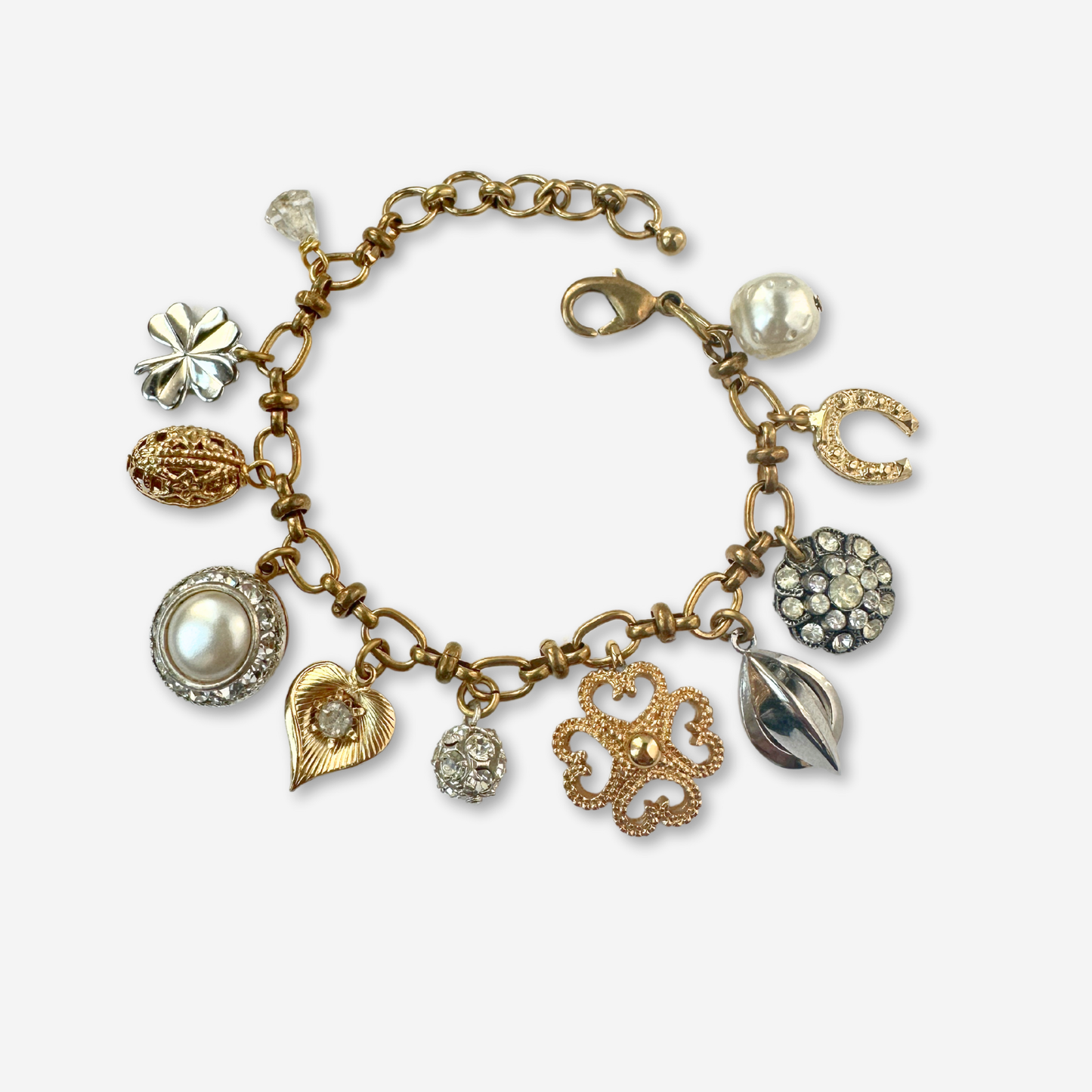 Repurposed vintage silver and brass good luck charm bracelet