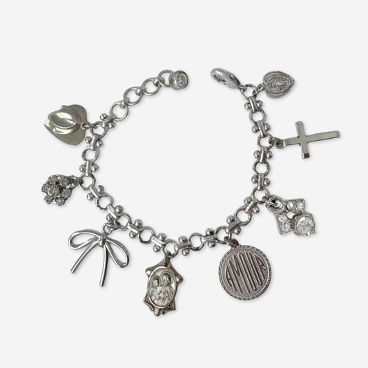 Repurposed vintage mixed silver religious charm bracelet
