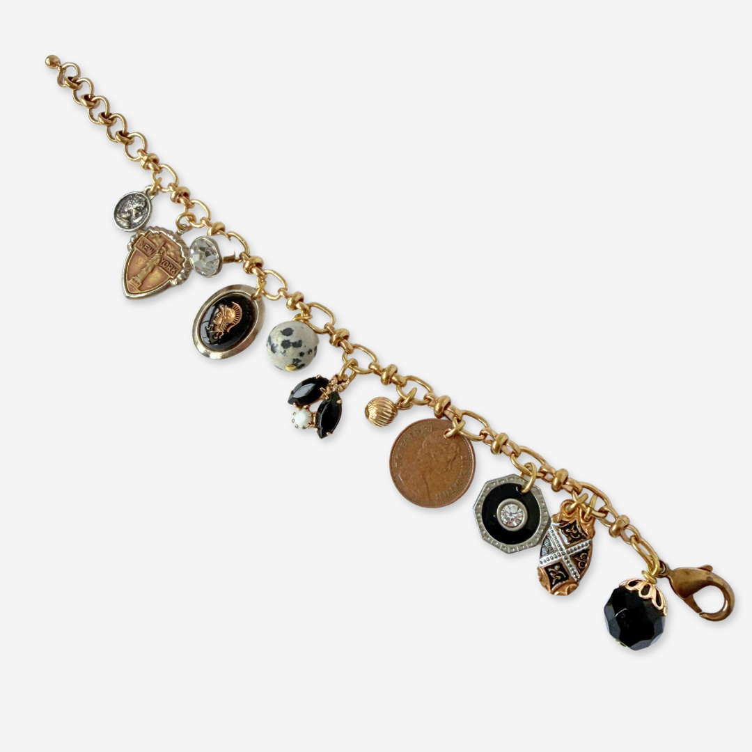Repurposed vintage mixed charm bracelet