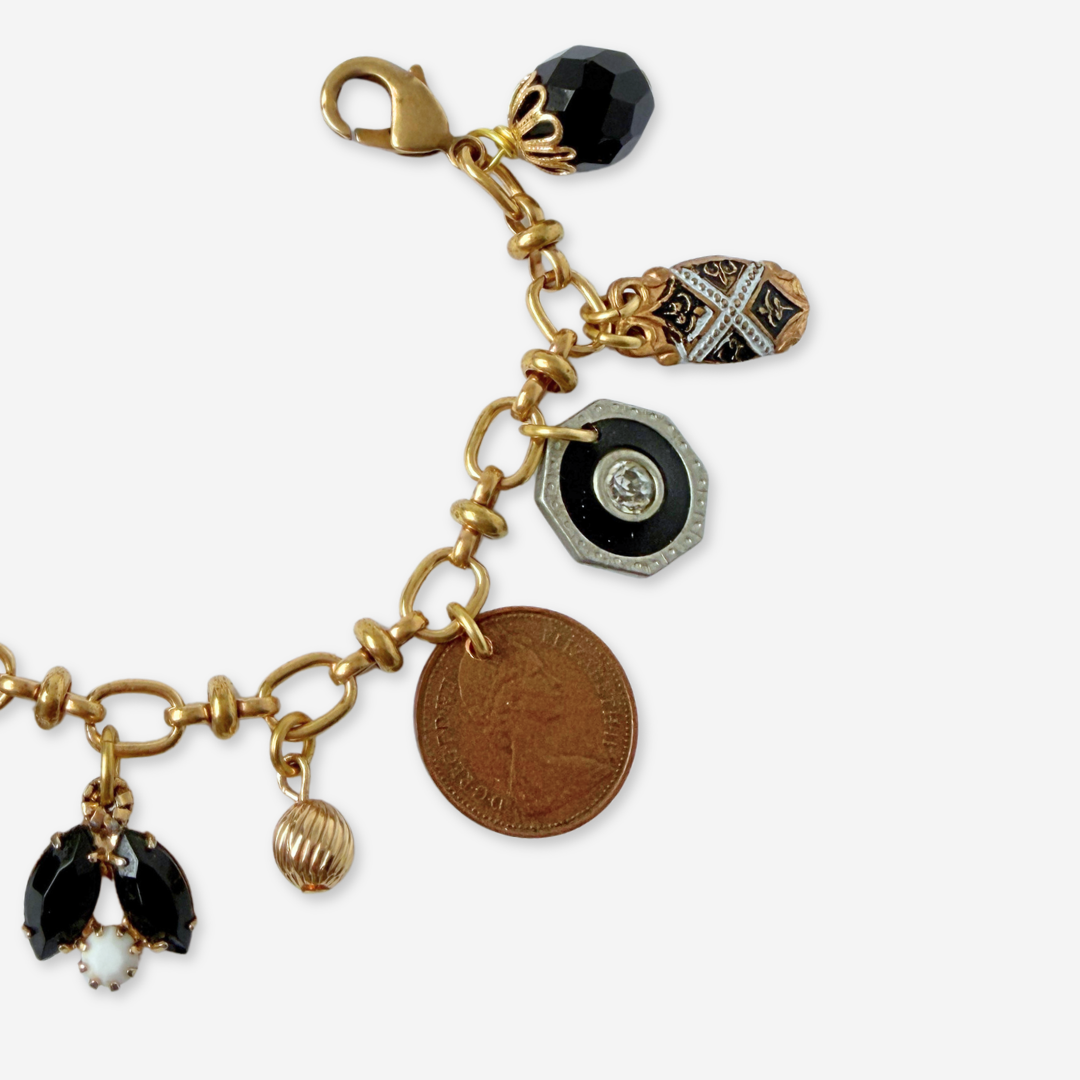 Repurposed vintage mixed charm bracelet