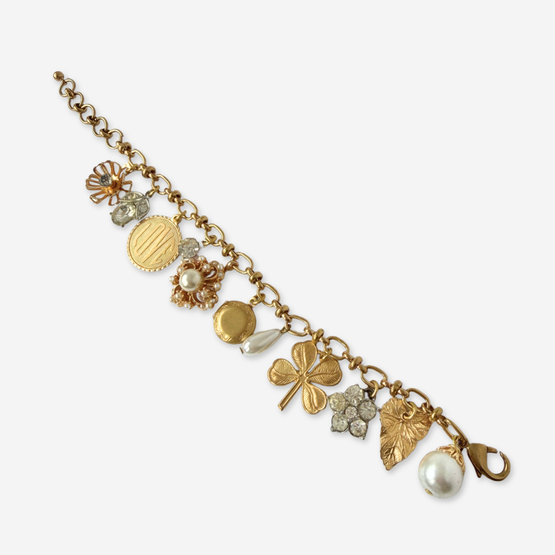 Repurposed vintage mixed neutral charm bracelet