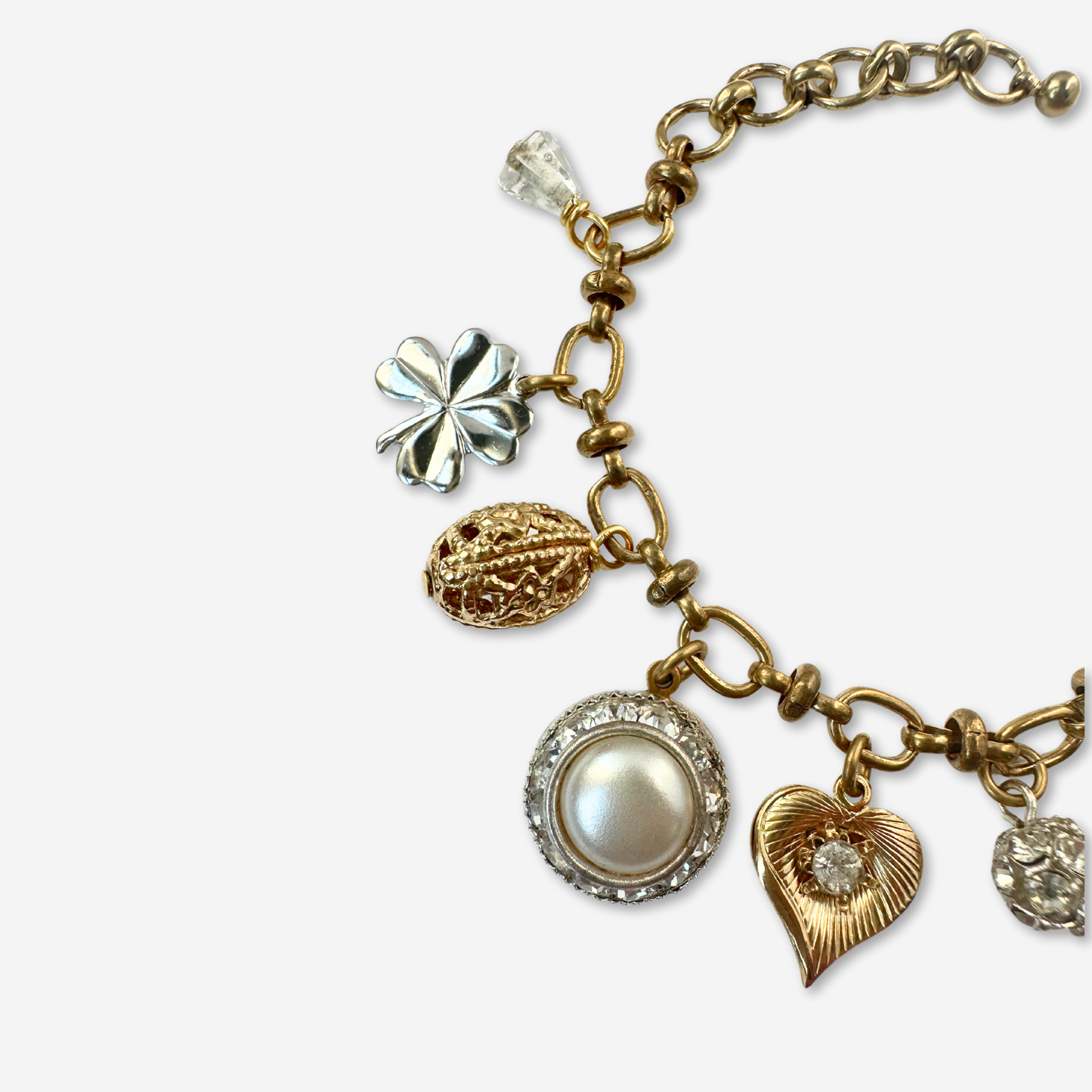 Repurposed vintage silver and brass good luck charm bracelet