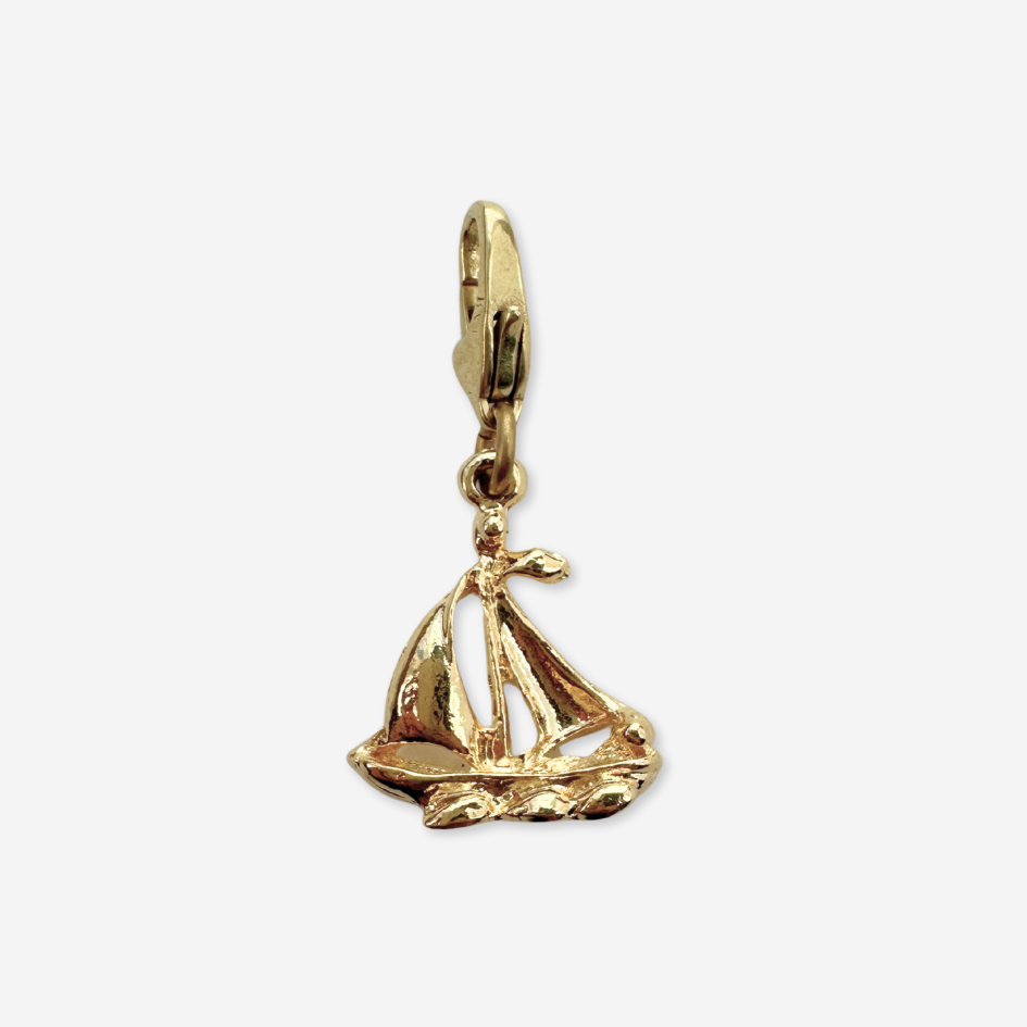Small vintage gold plated sailboat charm