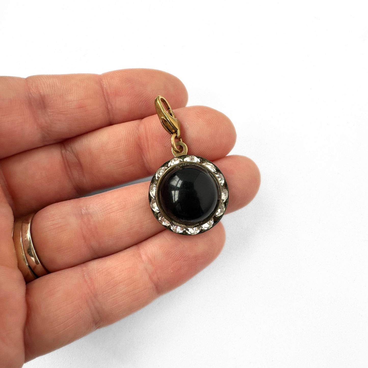 Vintage black and clear rhinestone round charm