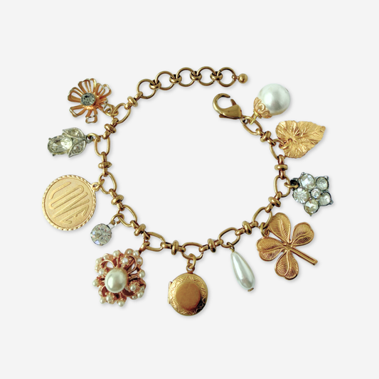 Repurposed vintage mixed neutral charm bracelet