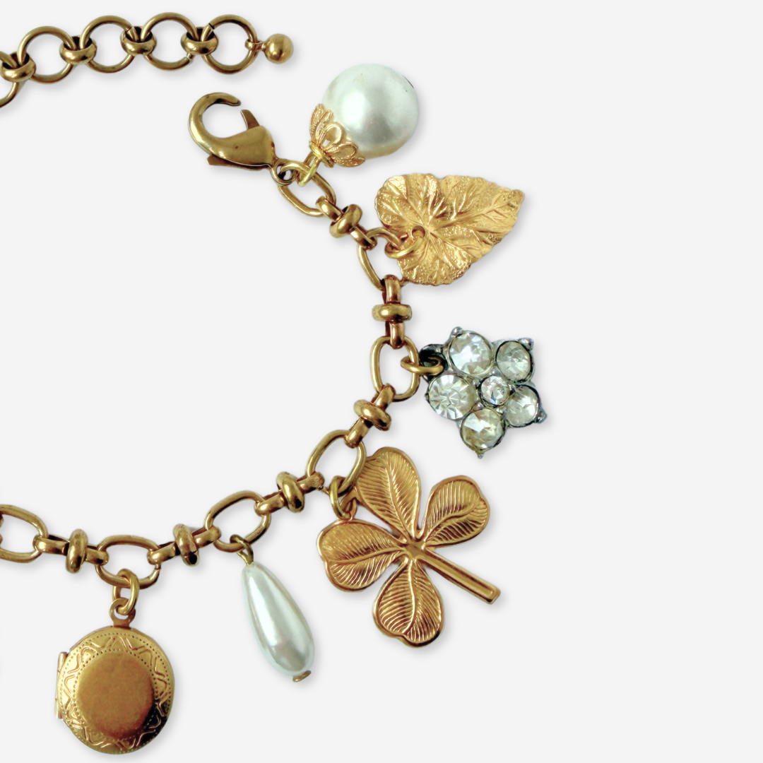 Repurposed vintage mixed neutral charm bracelet