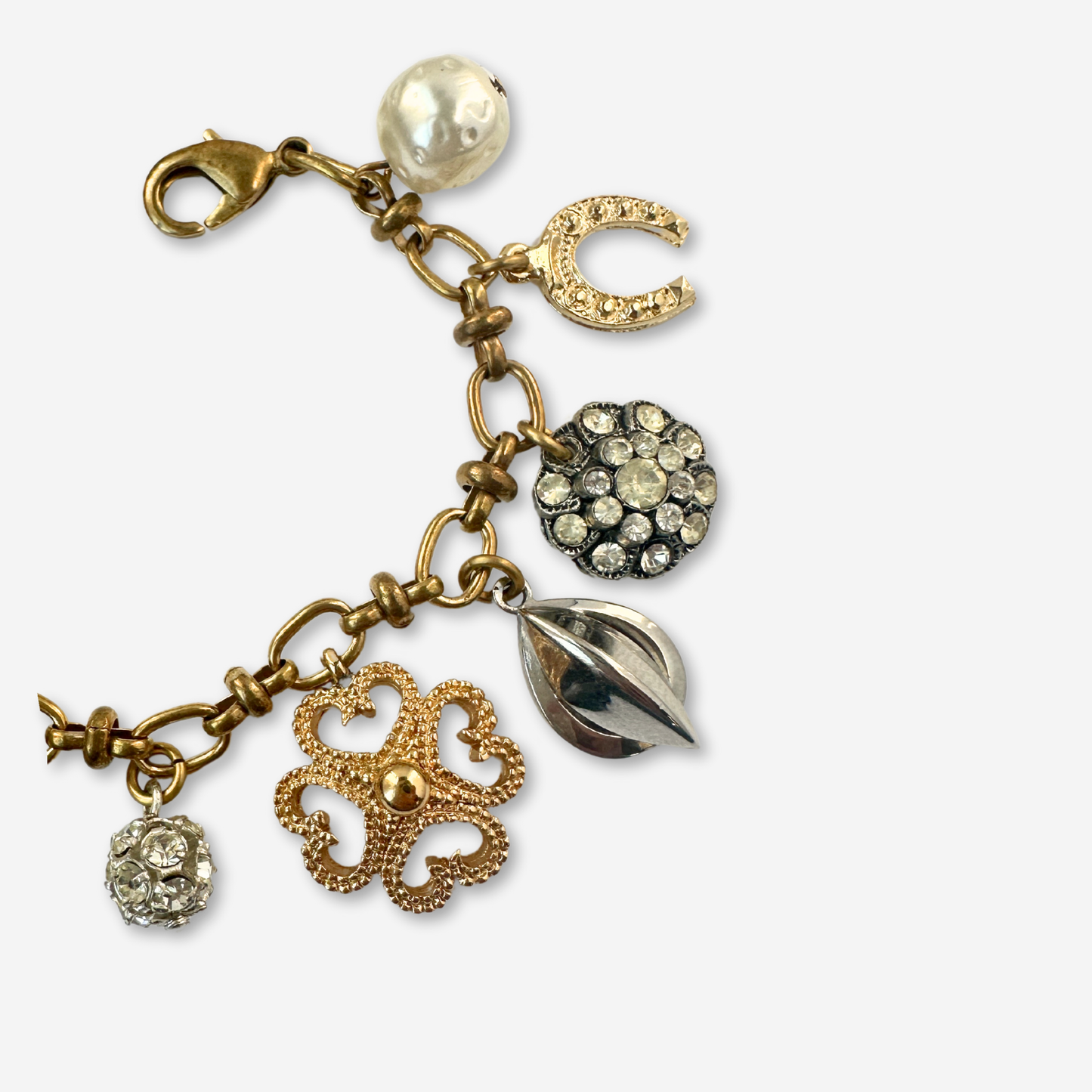 Repurposed vintage silver and brass good luck charm bracelet