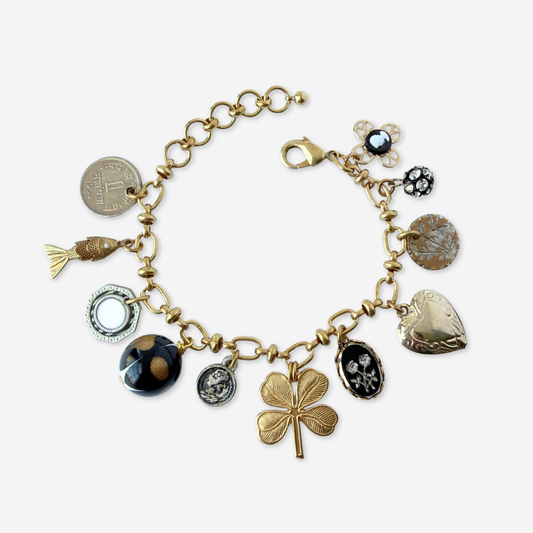Repurposed vintage mixed neutral charm bracelet