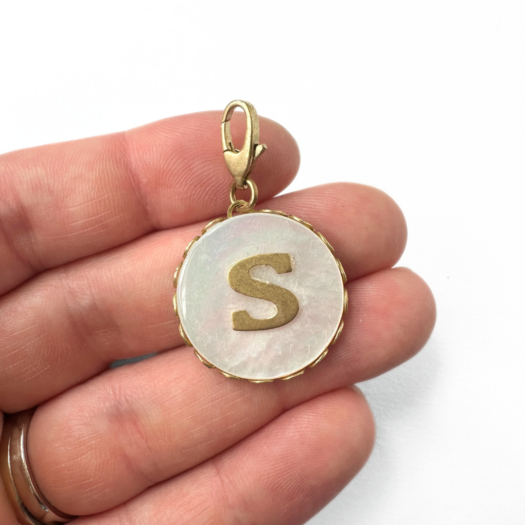 Vintage mother of pearl and brass "S" monogram circular charm