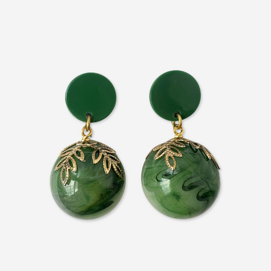 Oversized vintage green swirl bead earrings with brass leaf bead cap