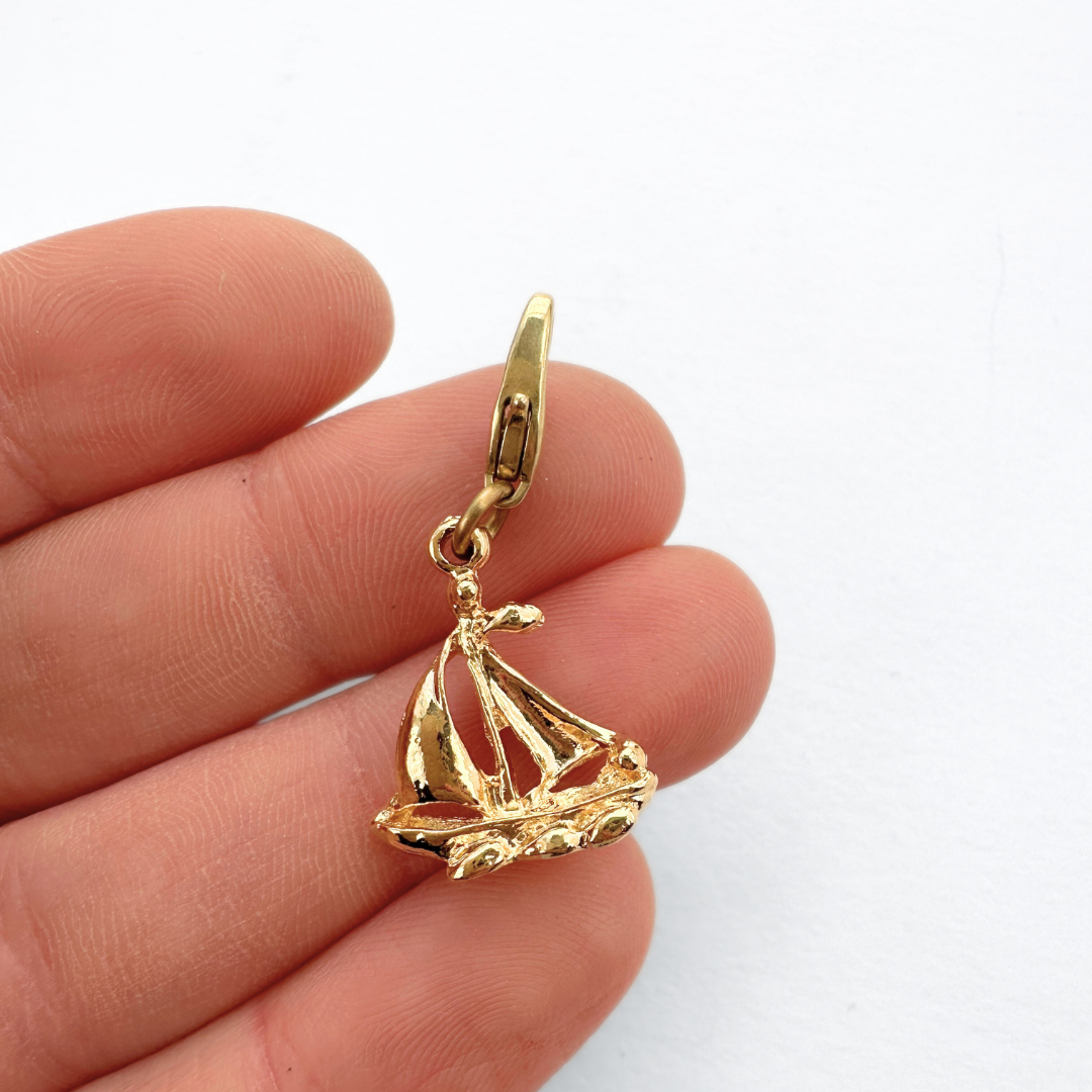 Small vintage gold plated sailboat charm