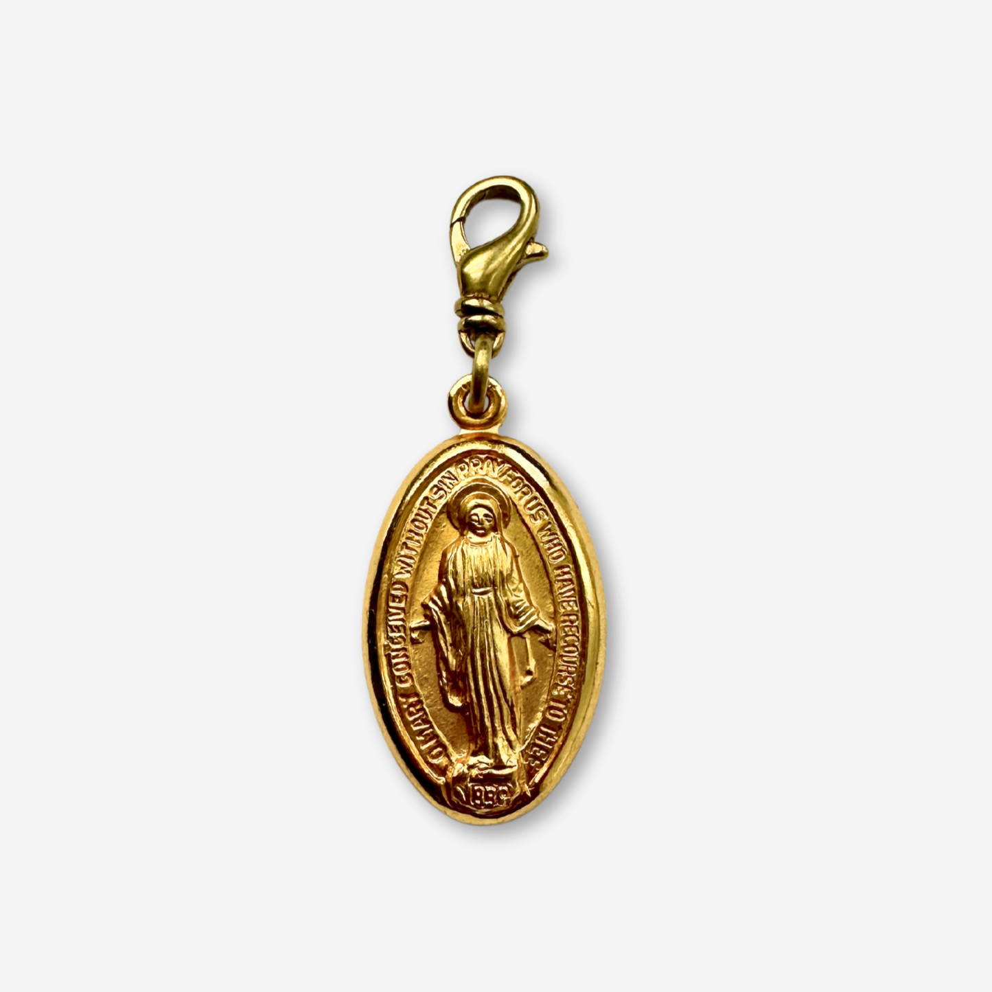 Vintage gold tone miraculous medal charm with brass swivel clasp