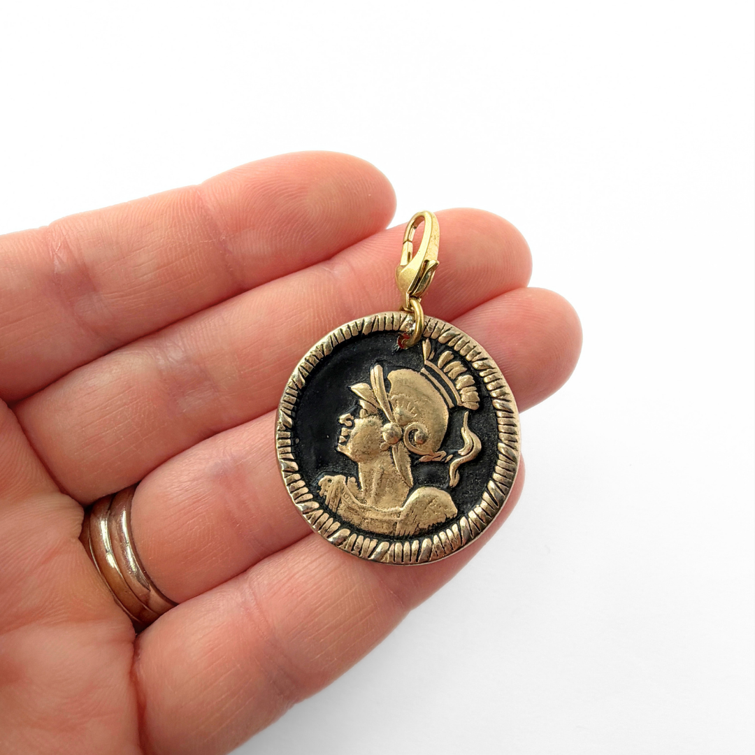 Large vintage gold plated and black enamel Roman solider charm