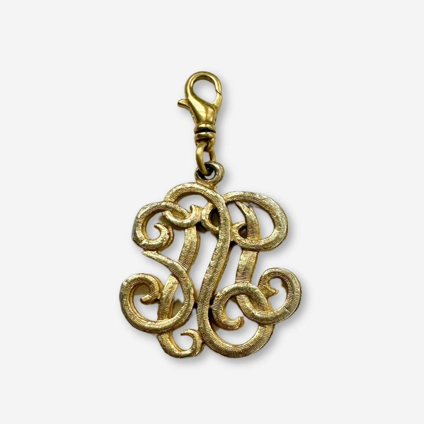 Vintage muted gold "generic monogram" charm with swivel clasp